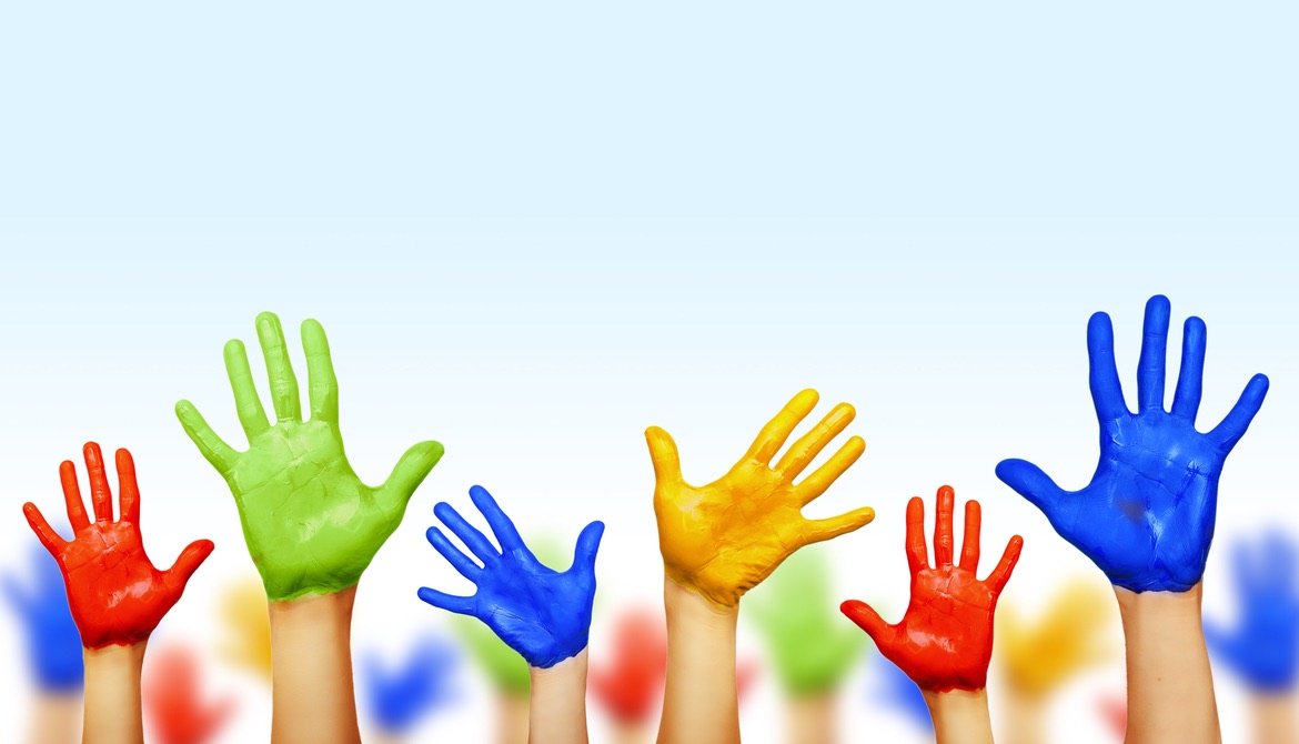 colorful painted hands raised to indicate consensus