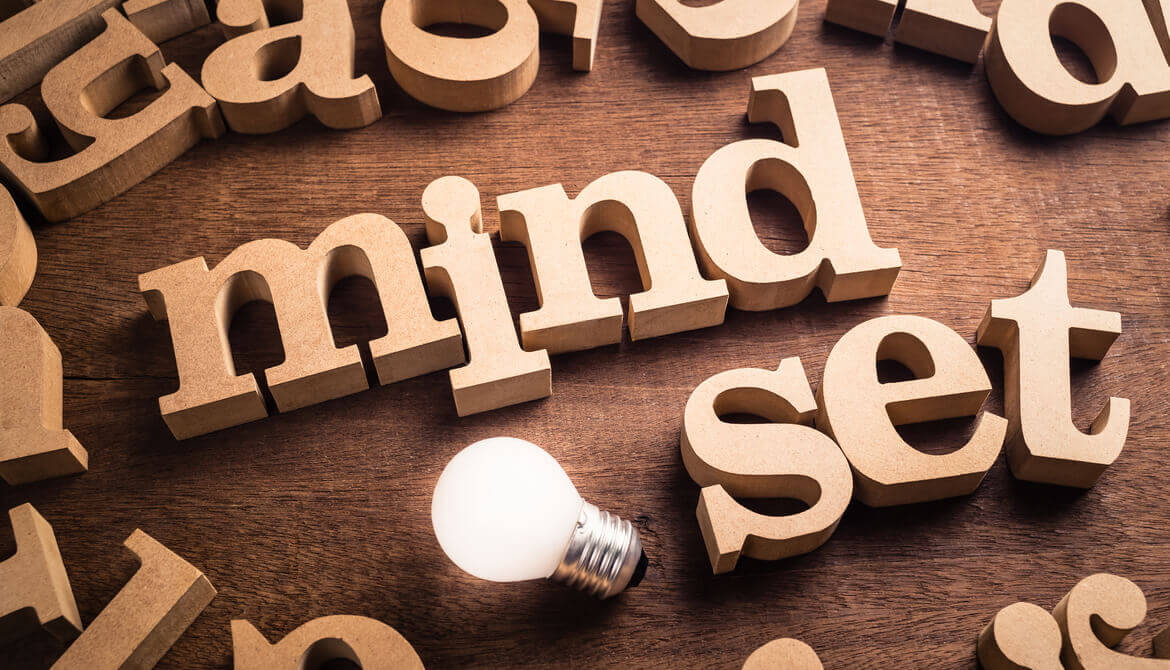 mindset word wood letters with lightbulb