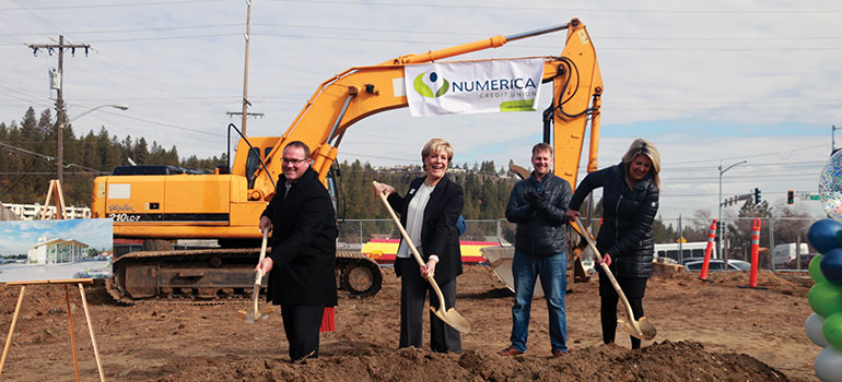 Carla Cicero breaks ground on new Numerica Credit Union branch with Board Chair Wes Mortensen and Mayor Nadine Woodward