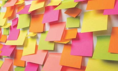 a wall covered in colorful sticky notes
