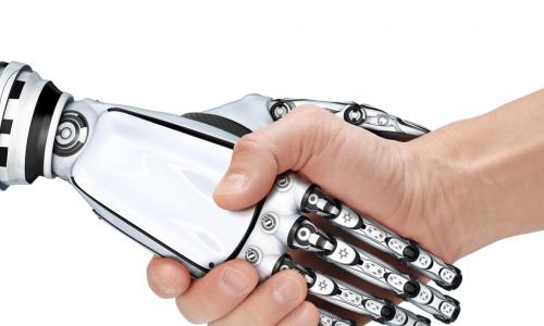 robot hand shaking human hand