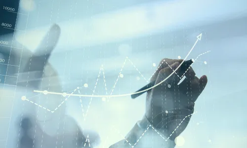 hands mapping out an upswing on graph 