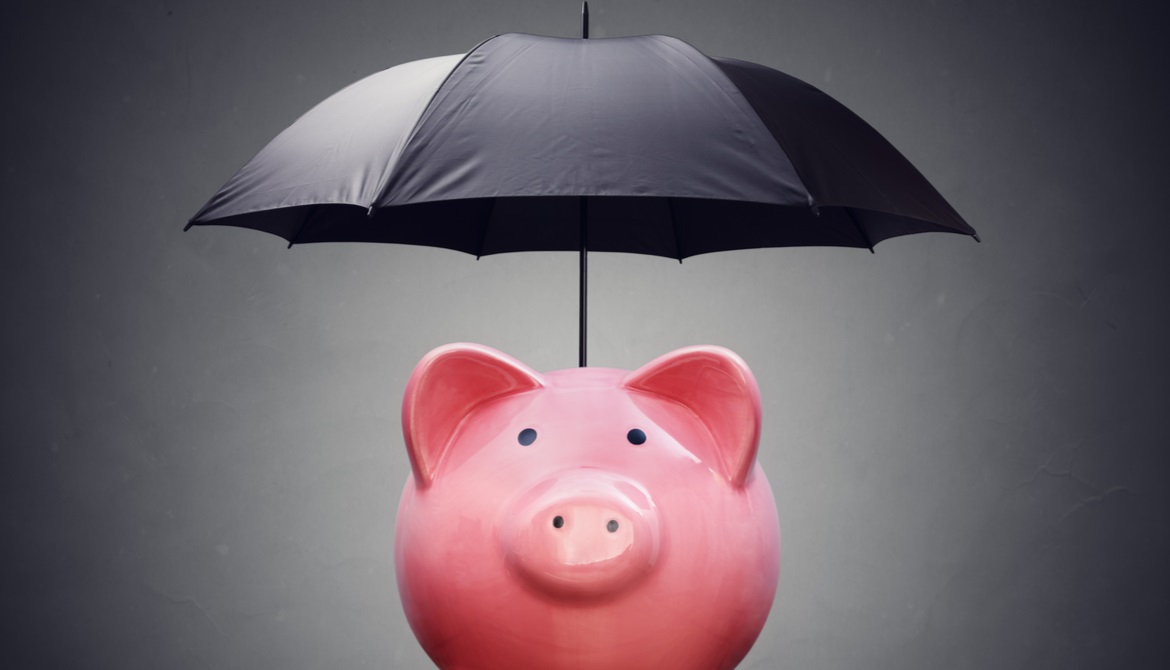 piggy bank with umbrella denoting bond insurance