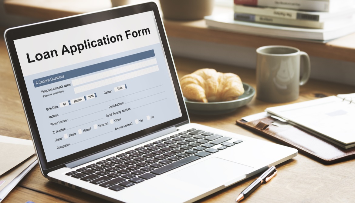 empty loan application form displaying on a laptop screen