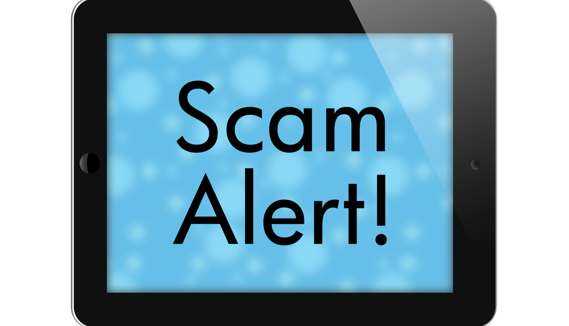 tablet with words scam alert