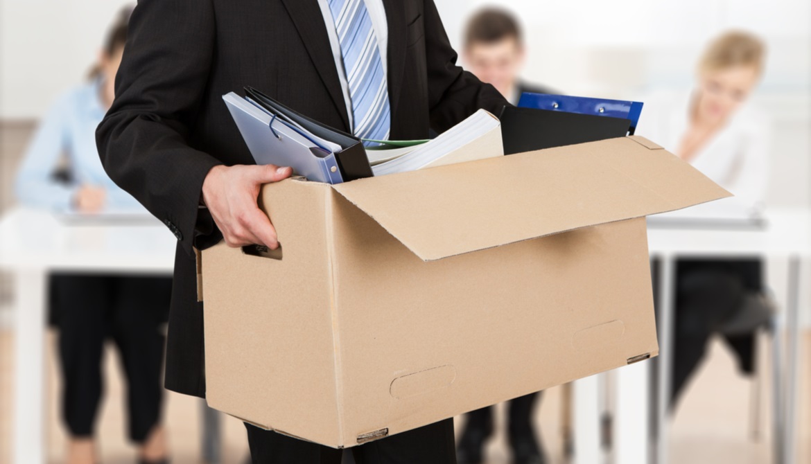 executive caring box full of his possessions 