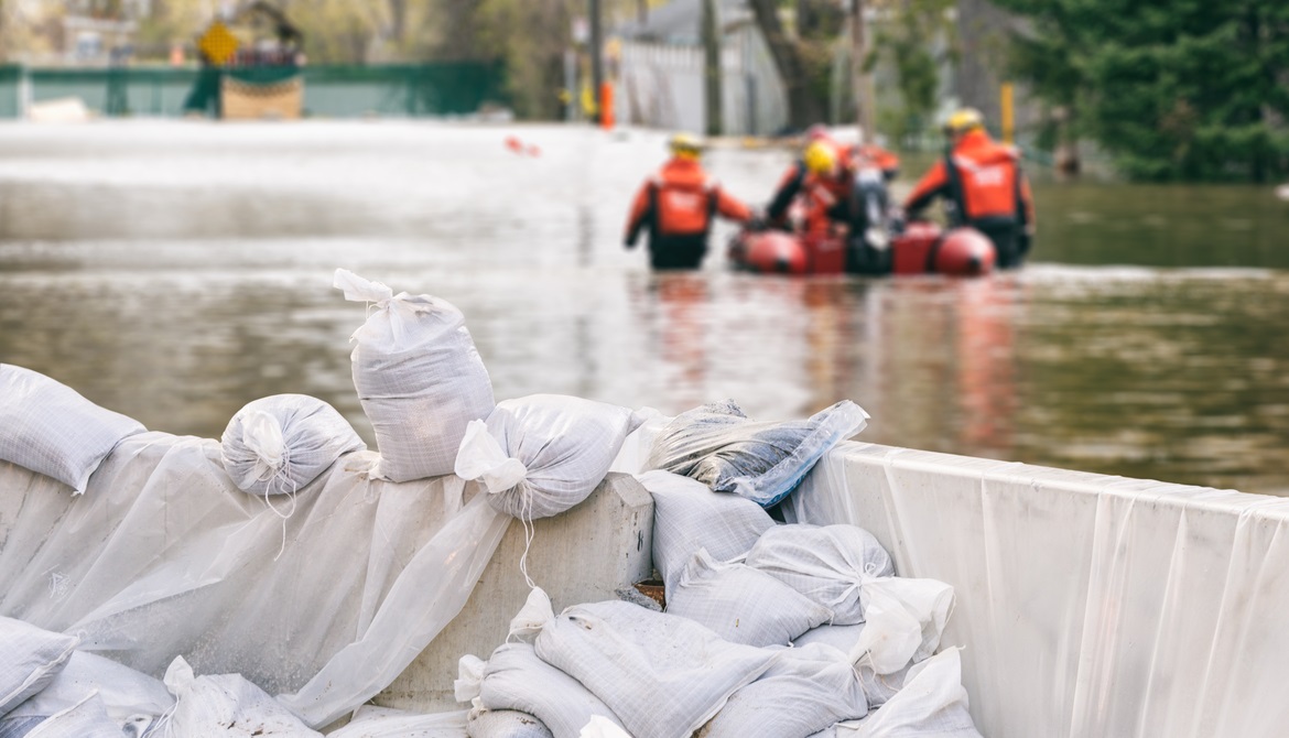 sand bags and flood rescue personnel
