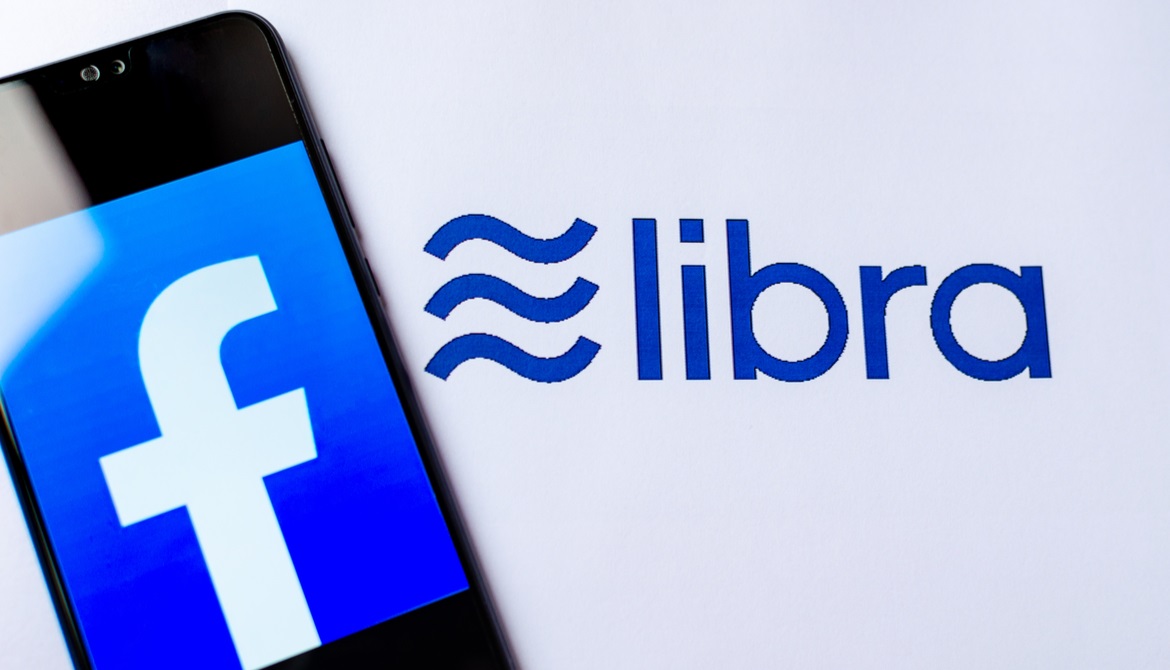Facebook and Library logos with a smartphone