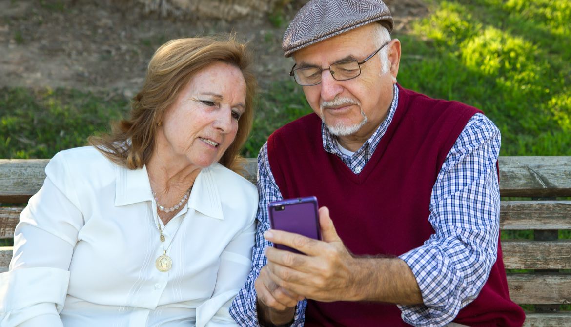 senior couple with smart phone