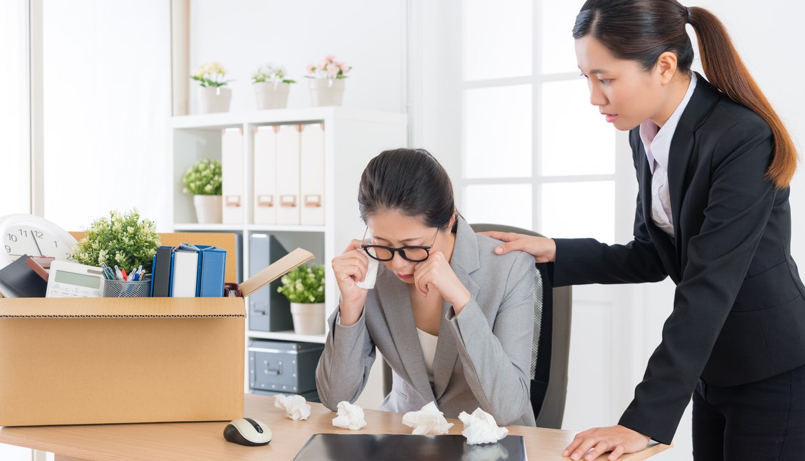 kind manager consoles a female employee after she has been fired