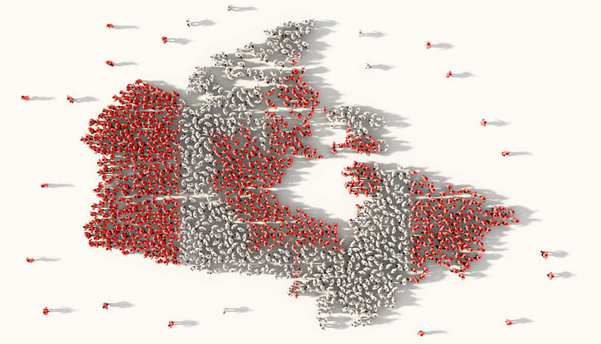 Large group of people forming Canada map and national flag