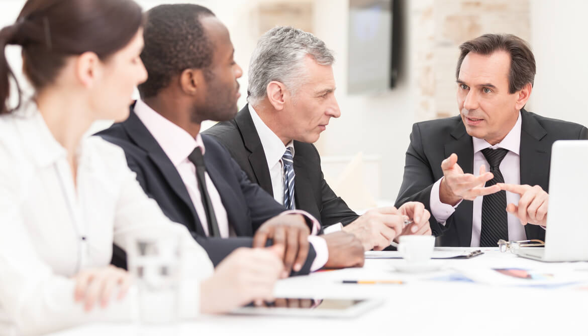 business people meeting and looking serious