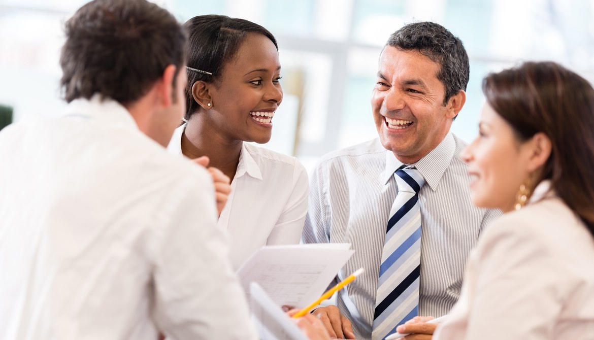 diverse team laughing together