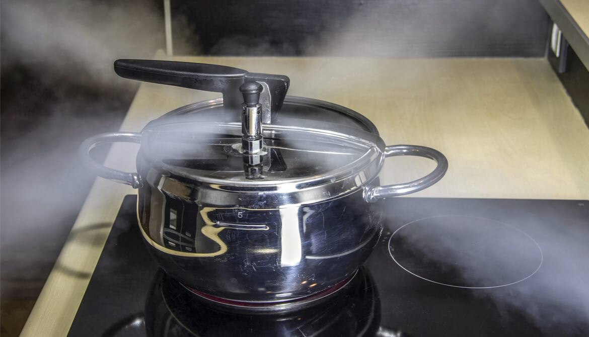 pressure cooker releasing hot steam