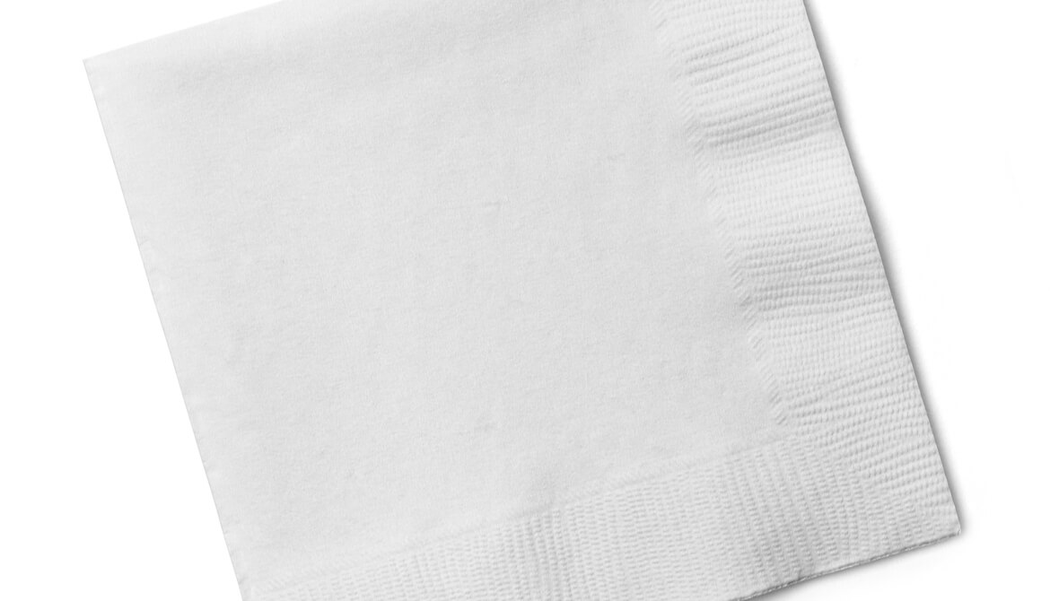 white paper napkin on white background