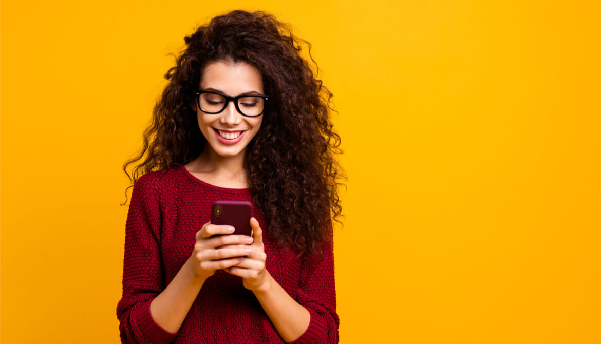 young woman engaged with her smartphone