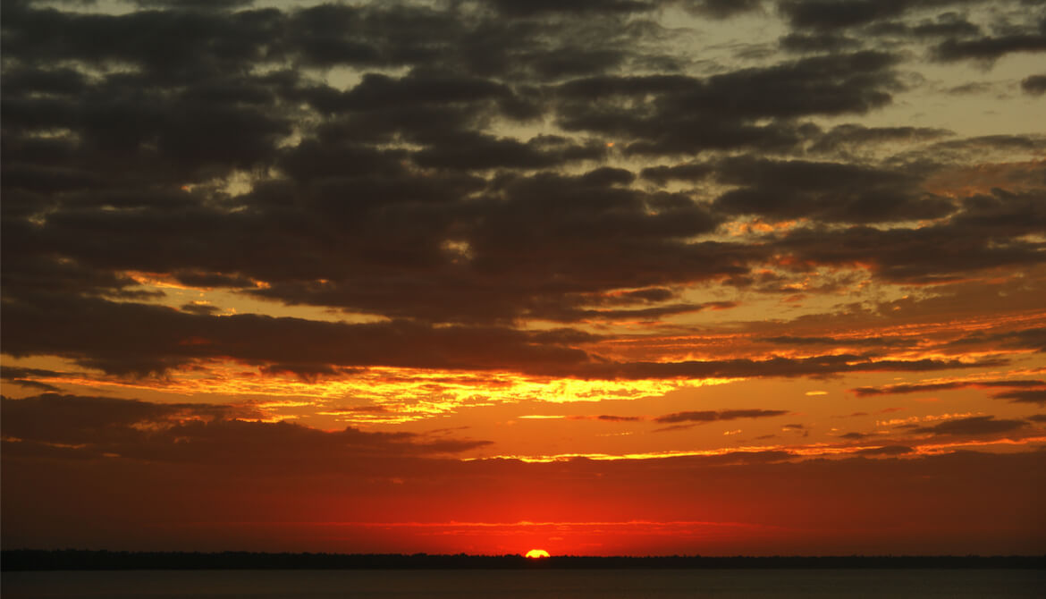 dawning sky over lake