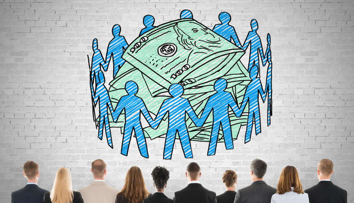 group of diverse executives looking at an illustration on the wall of a circle of paper dolls around money