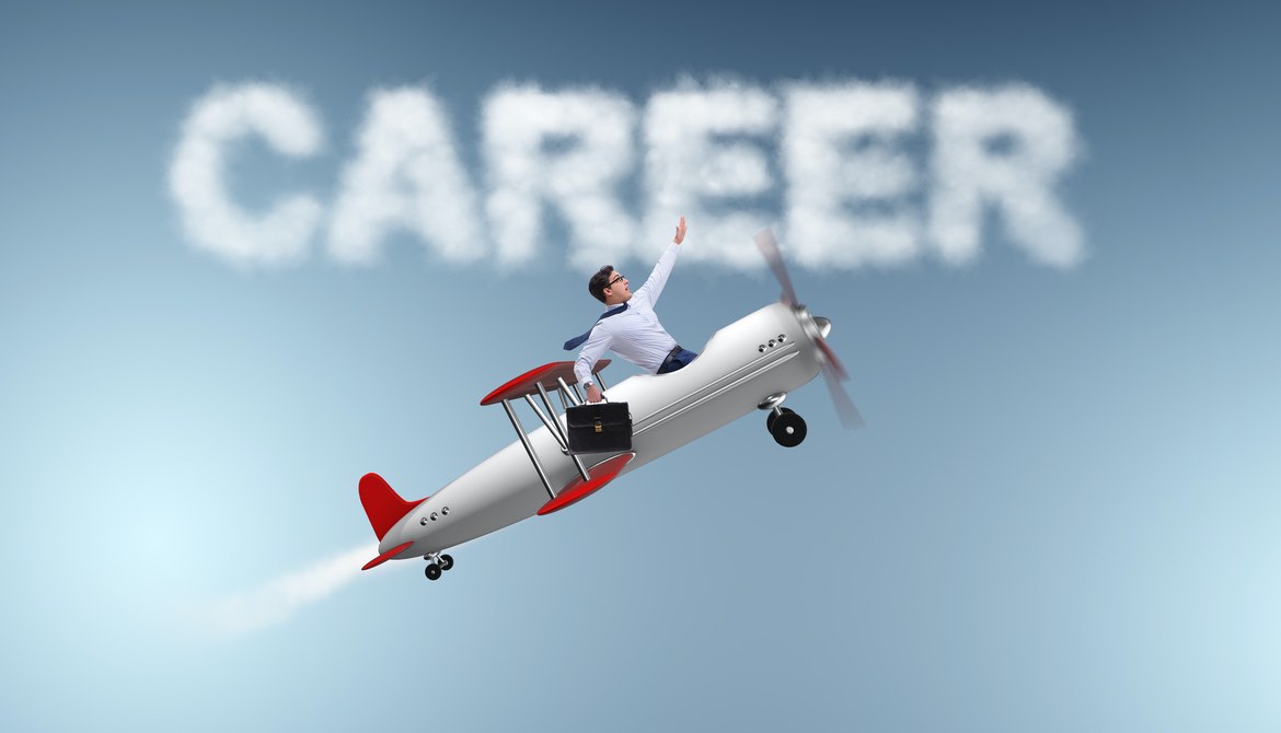  Businessman flying in an airplane career concept
