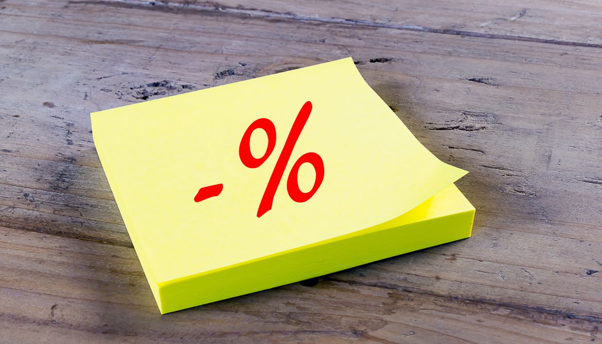 yellow sticky note with negative percentage sign