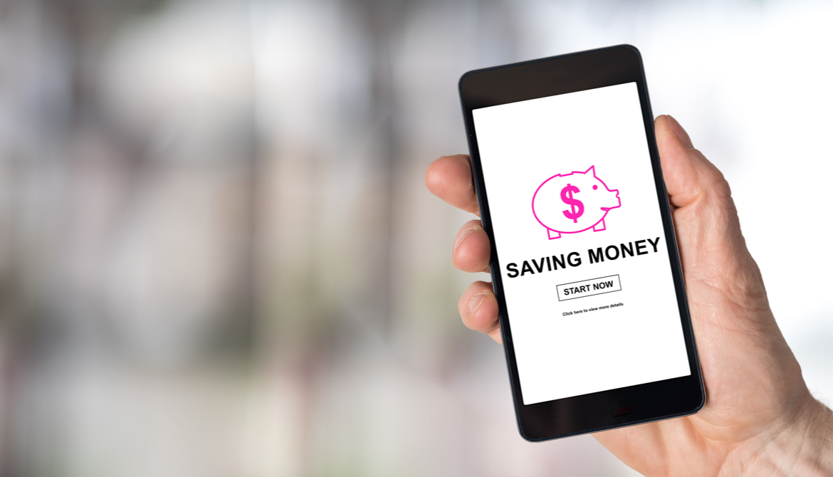 smartphone showing a savings app with a piggy bank