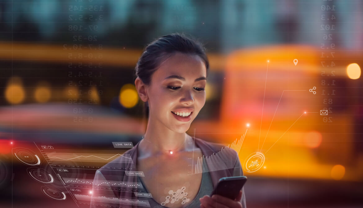 smiling young Asian woman uses app on smartphone while holographic images of technology infrastructure glow around her