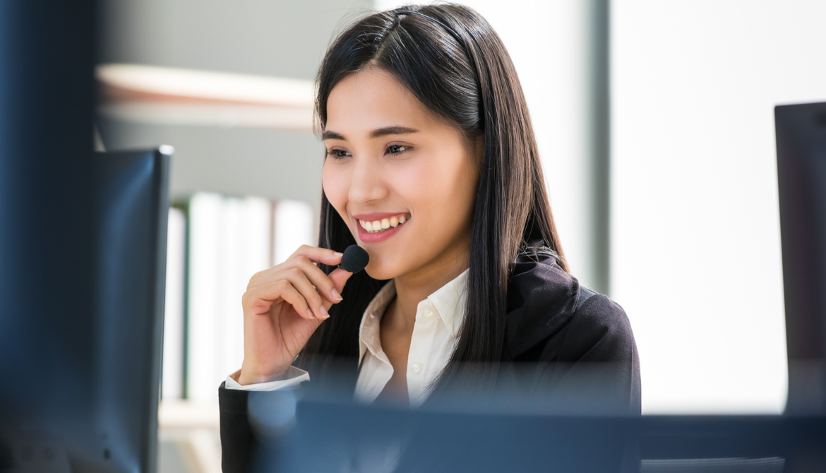 woman in a call center with computers