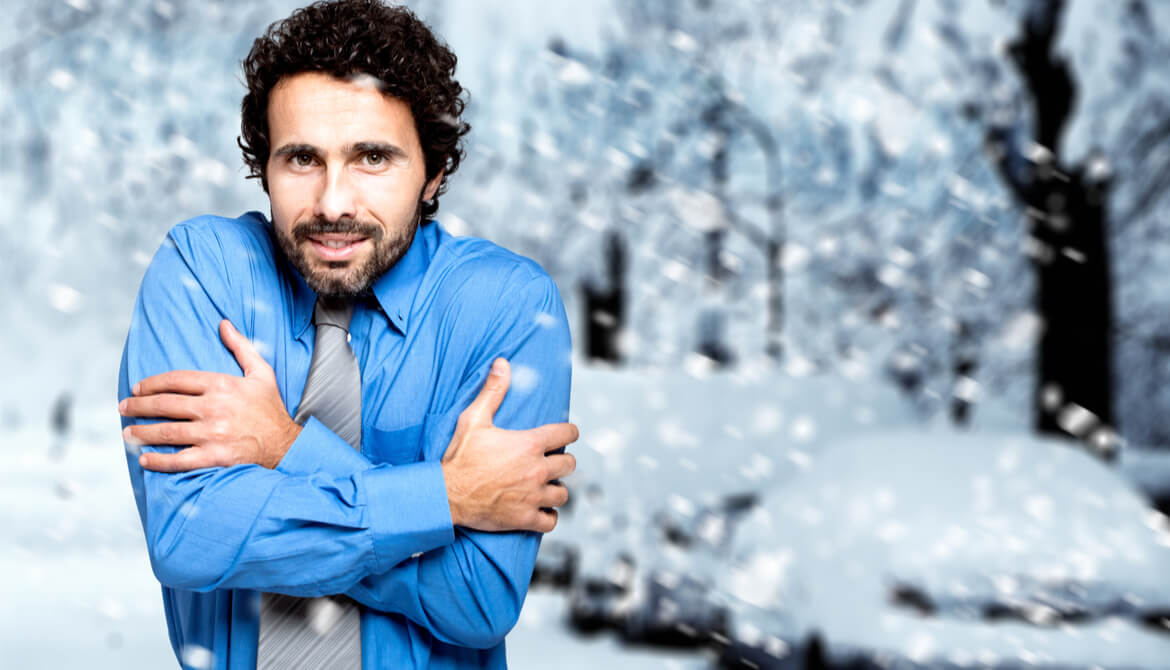 businessman freezing in blue shirt outdoors in winter