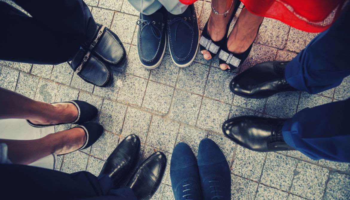 people in a circle with different shoes