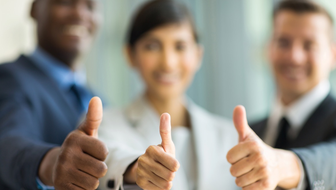 diverse executives thumbs up