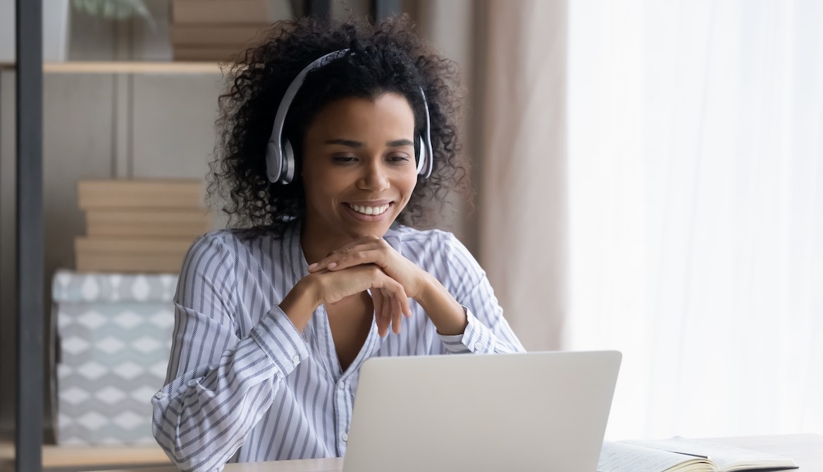 woman laptop headphones