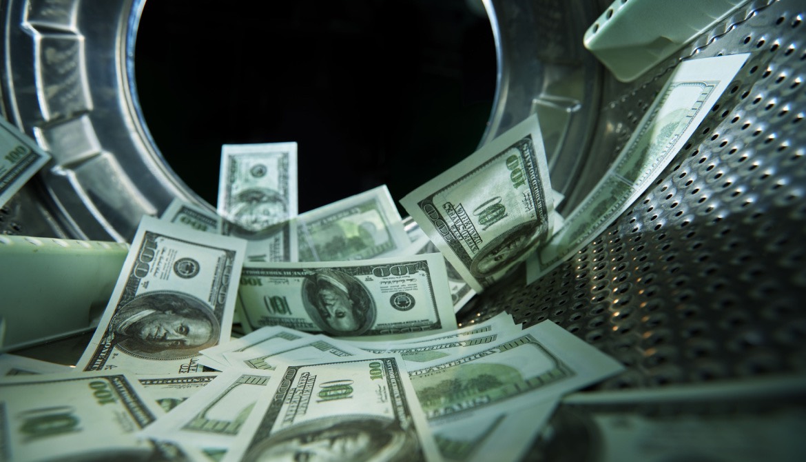 100 dollar bills inside a washing machine