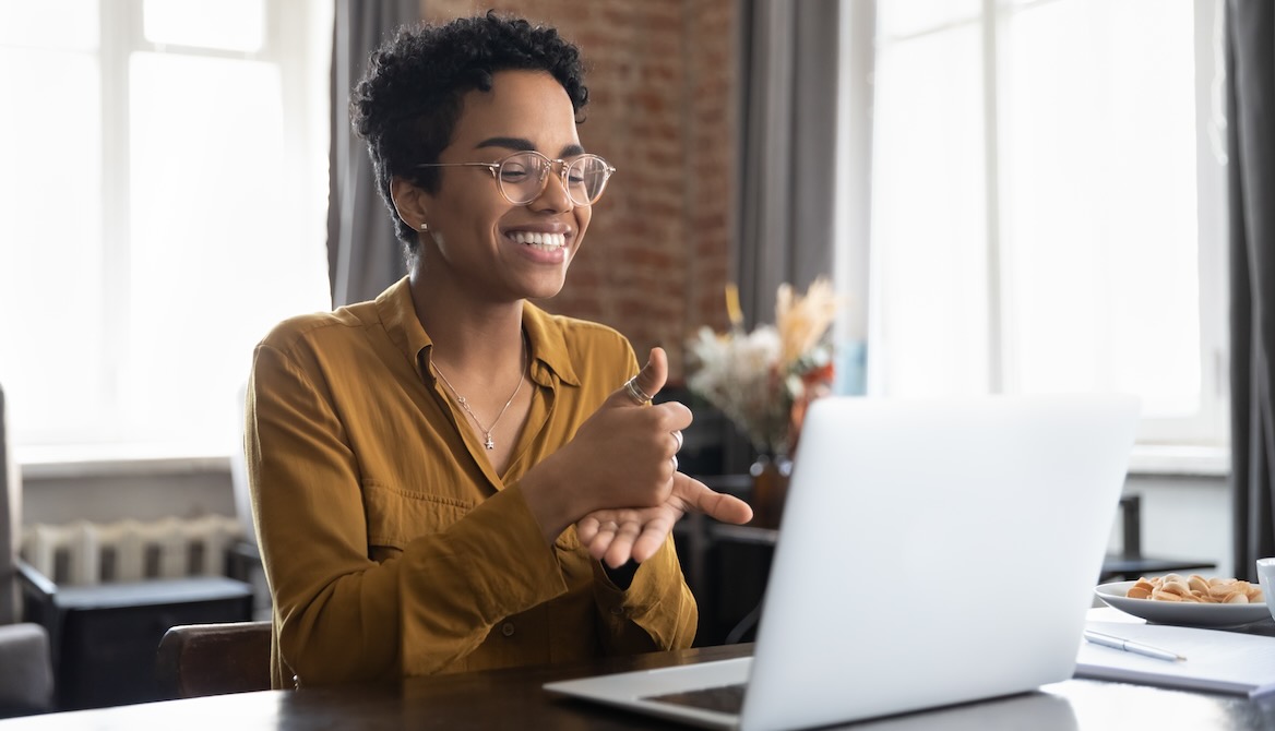 woman laptop signing