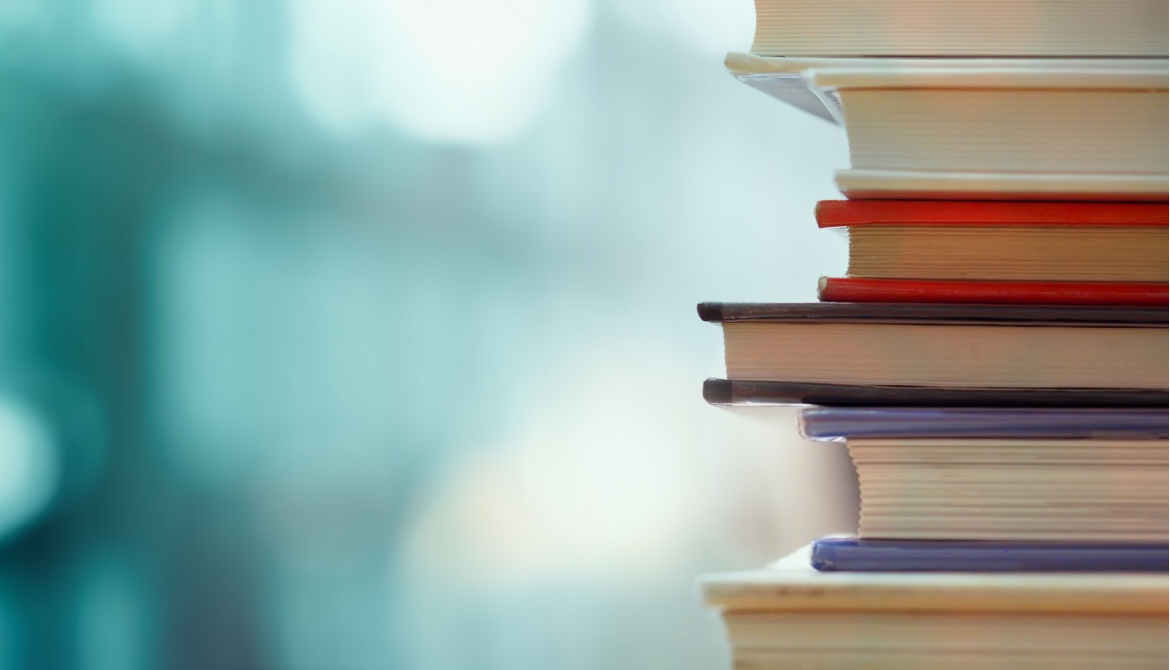a stack of business books