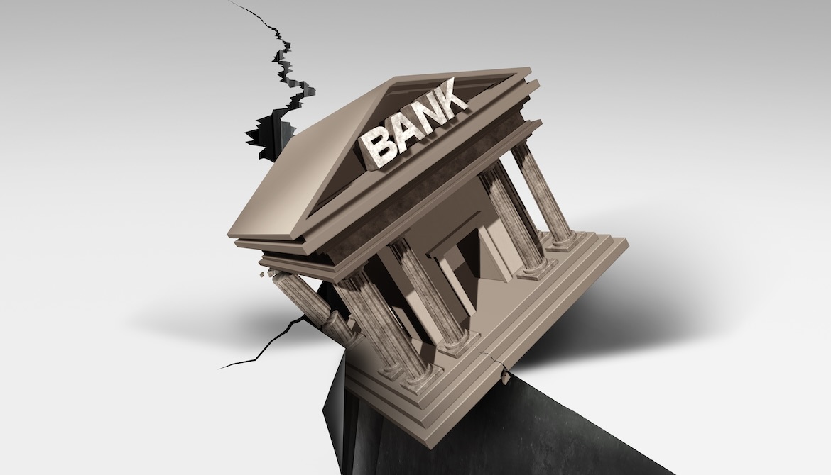 bank fails and falls down crack opening in the ground