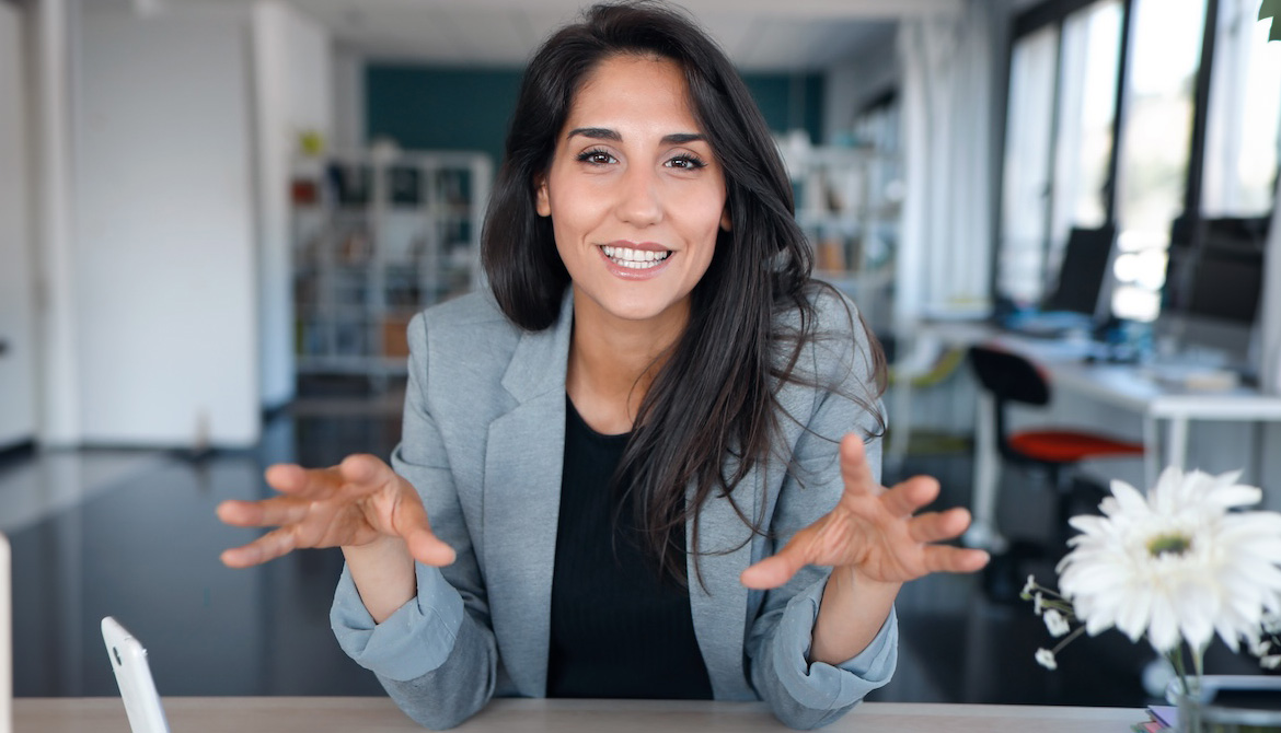 manager speaking confidently to camera