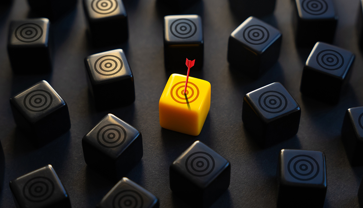 yellow target block with arrow dead center surrounded by black target blocks 