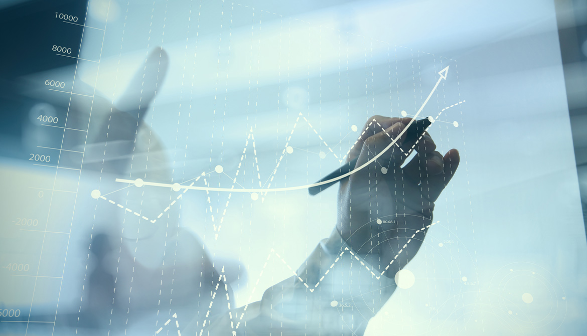 hands mapping out an upswing on graph 