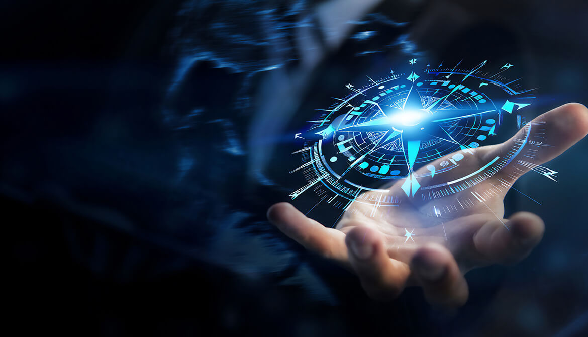 hand holding compass orb