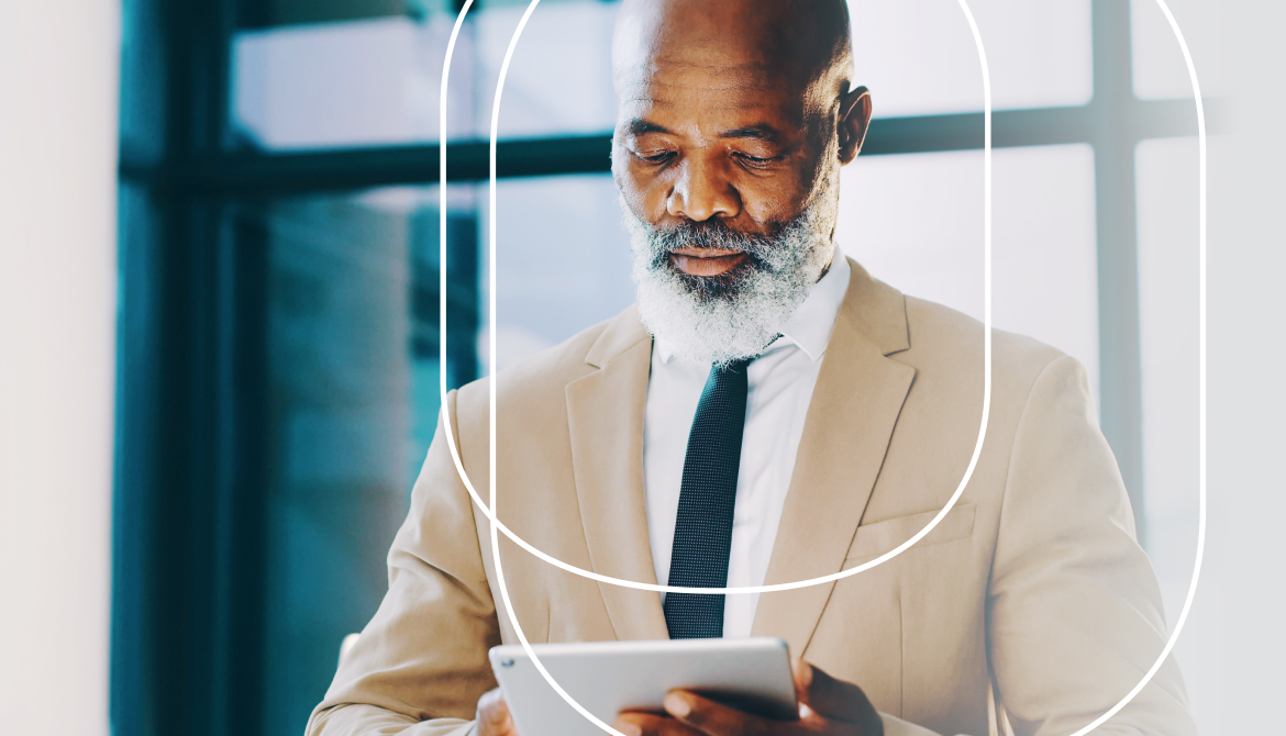 man looking at tablet
