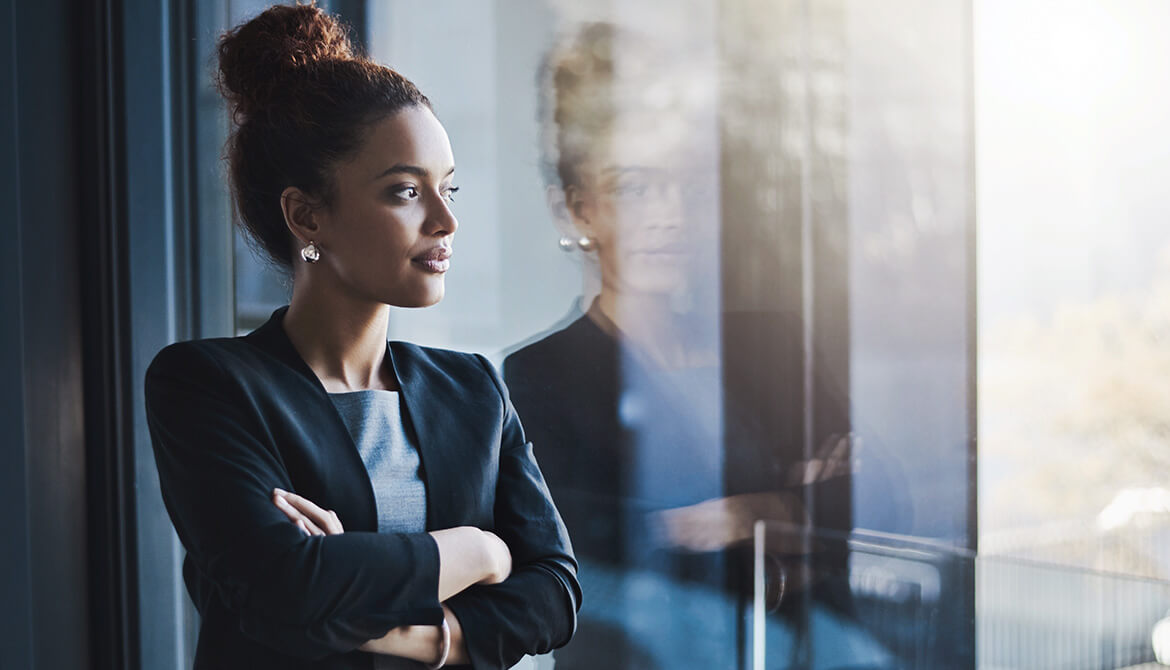 woman looking through window
