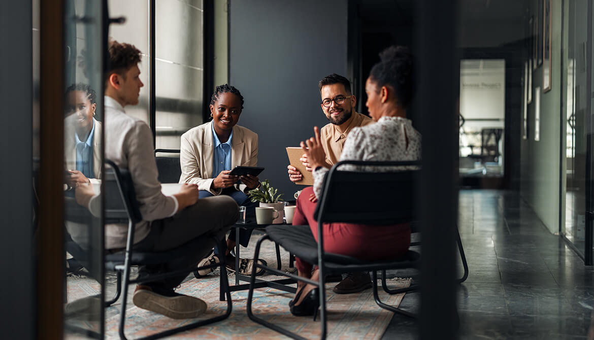 people sitting in circle having a discussion