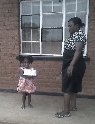 Eveness Mbokola and her daughter Neima