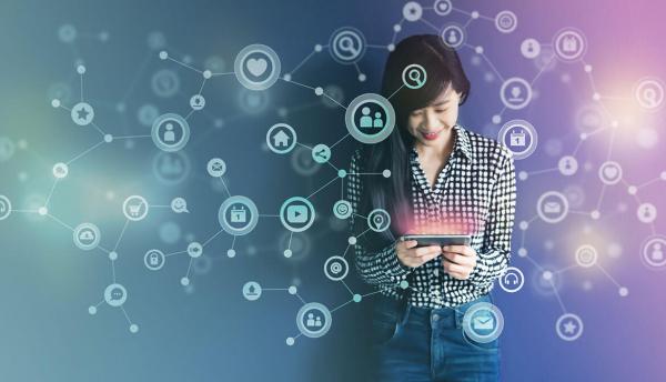 happy young woman using smartphone for social media and online banking