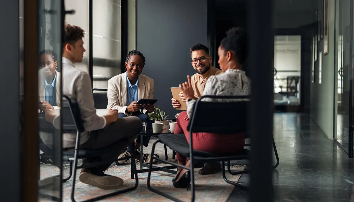 people sitting in circle having a discussion