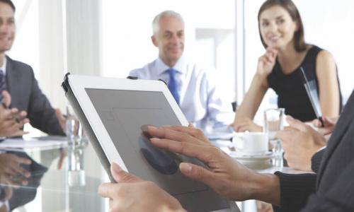 board member uses a tablet