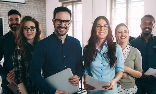 Group of happy employees at a successful company