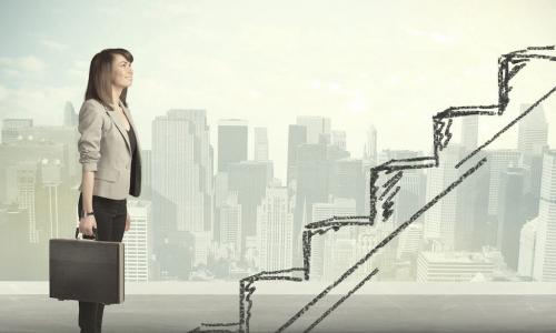 working woman standing in front of stairs drawn in pencil