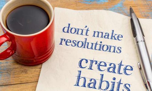 mug of coffee with words create habits
