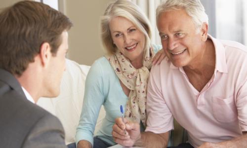 Financial representative assisting a couple